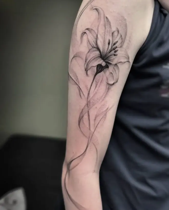 Fine line lily tattoo by Eric Axle Nashville