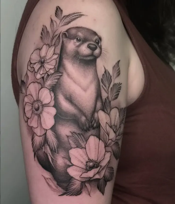 Black and grey otter and florals tattoo by Eric Axle Nashville