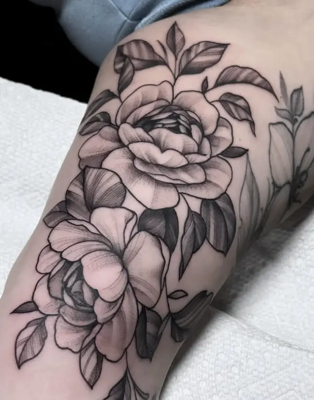 Black and grey rose tattoo by Eric Axle Nashville