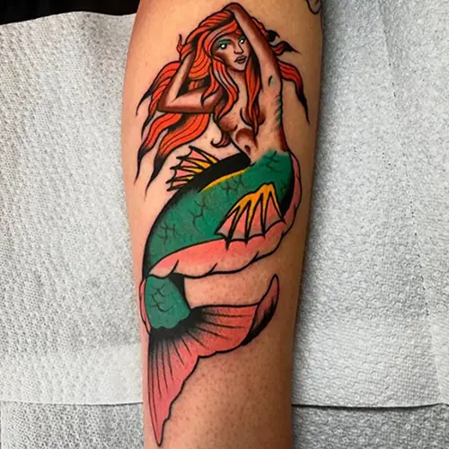 Black and grey character tattoo by Sasha Vandal