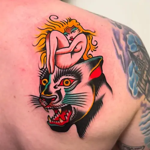 Color skull and scissors hand tattoo by Sasha Vandal